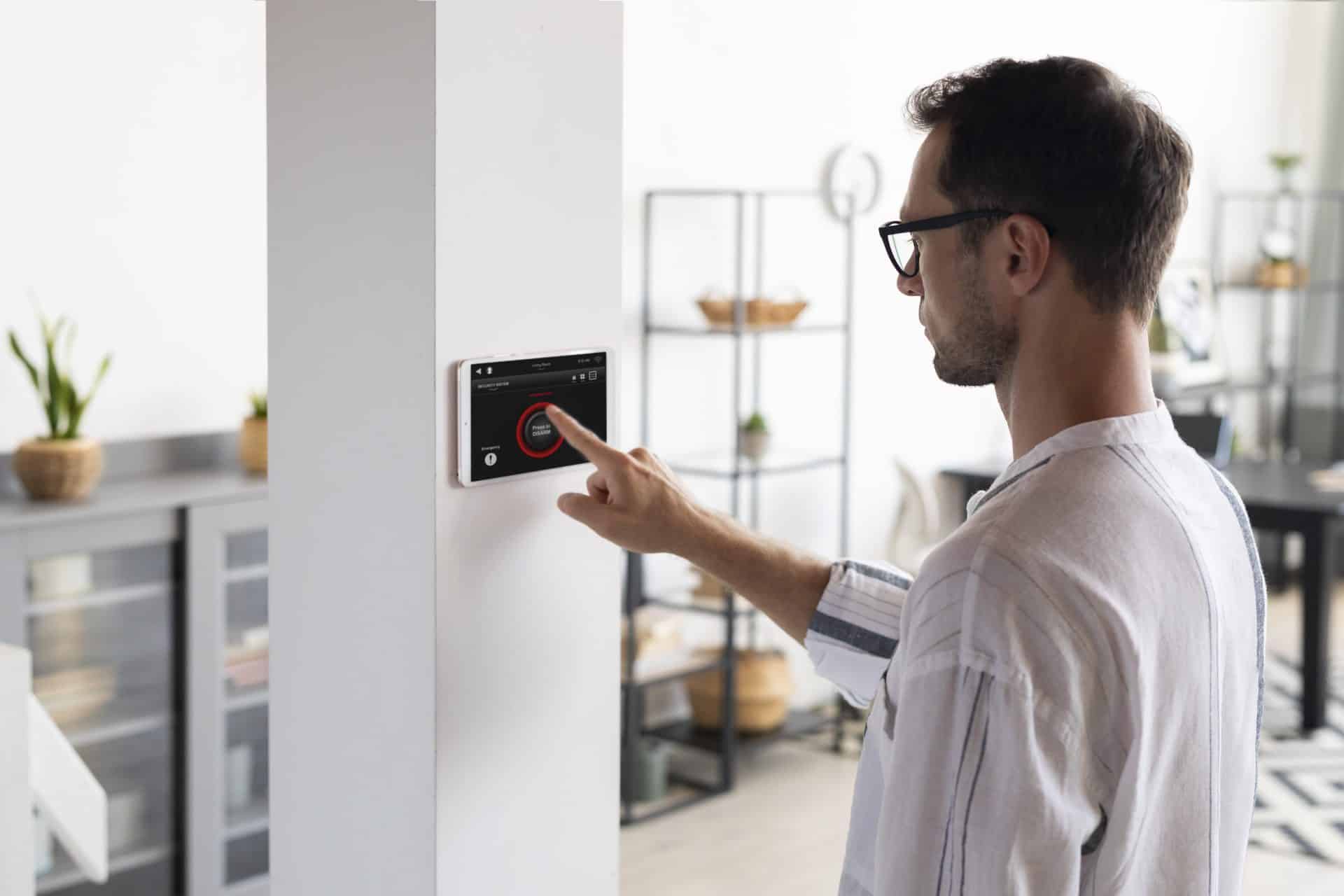 man using a thermostat